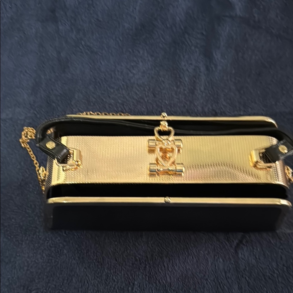Elegant Black and Gold Women's Clutch